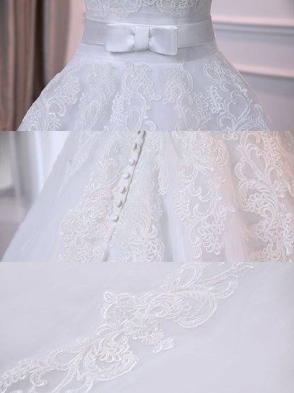 Brautkleider in Duchesse-Linie aus Ärmellosem Tüll mit V-Ausschnitt Gürtel Und Applikationen